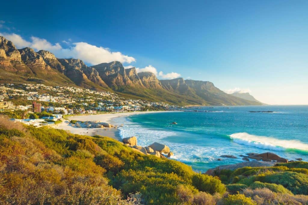 Stunning view of Table Mountain and the coastline of Cape Town, South Africa, illustrating the natural beauty and vibrant culture of the city