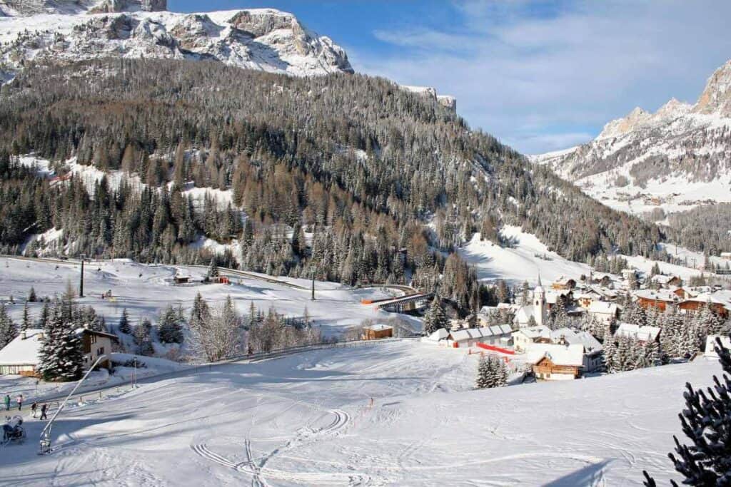 Winter Landscape with Dolomites, Ski Tracks and Alpine Village