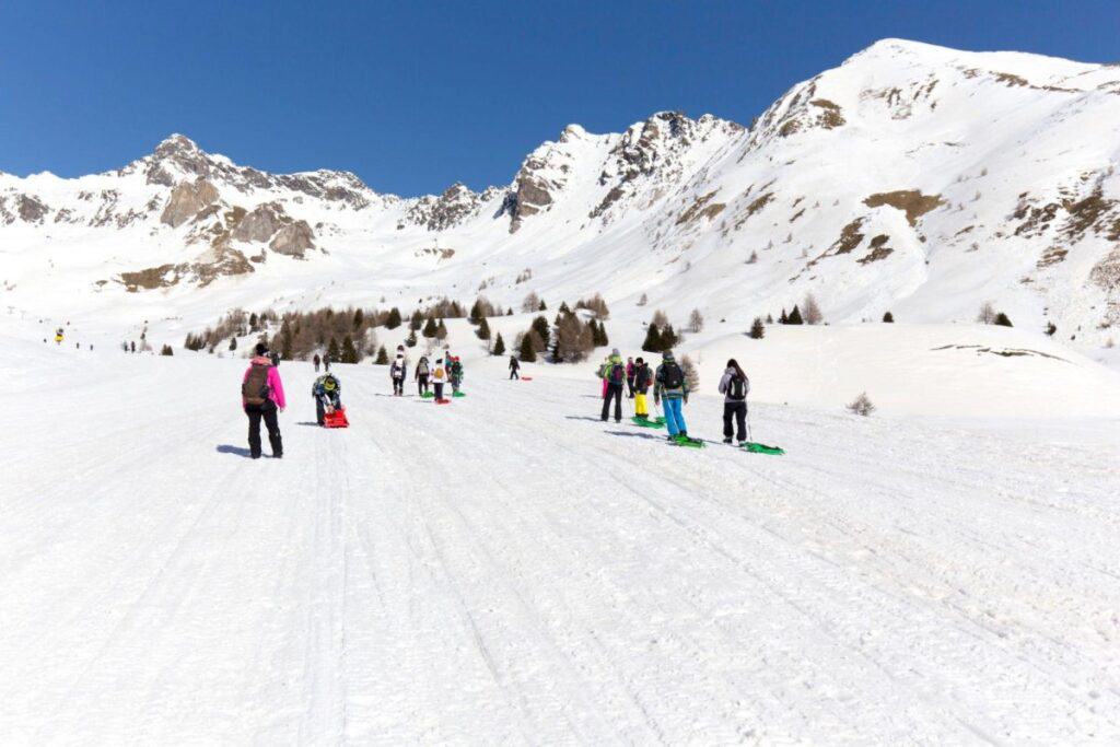 View of passo del Tonale during winter with winter tourists