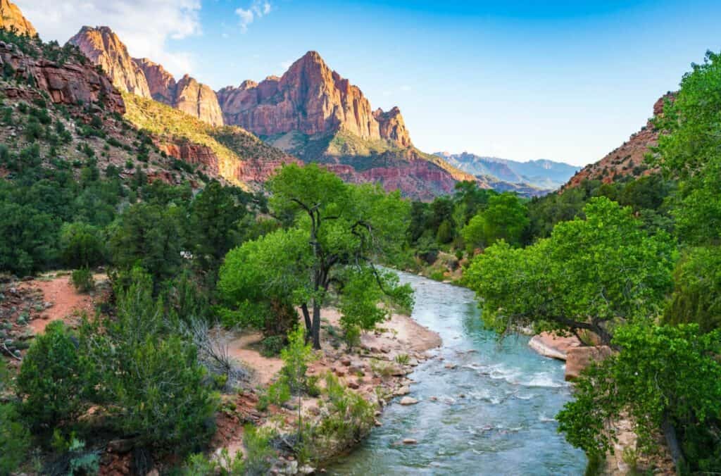 Landscape photo of The Watchman and the North Fork Virgin River at sunset in Zion National Park, Utah, USA